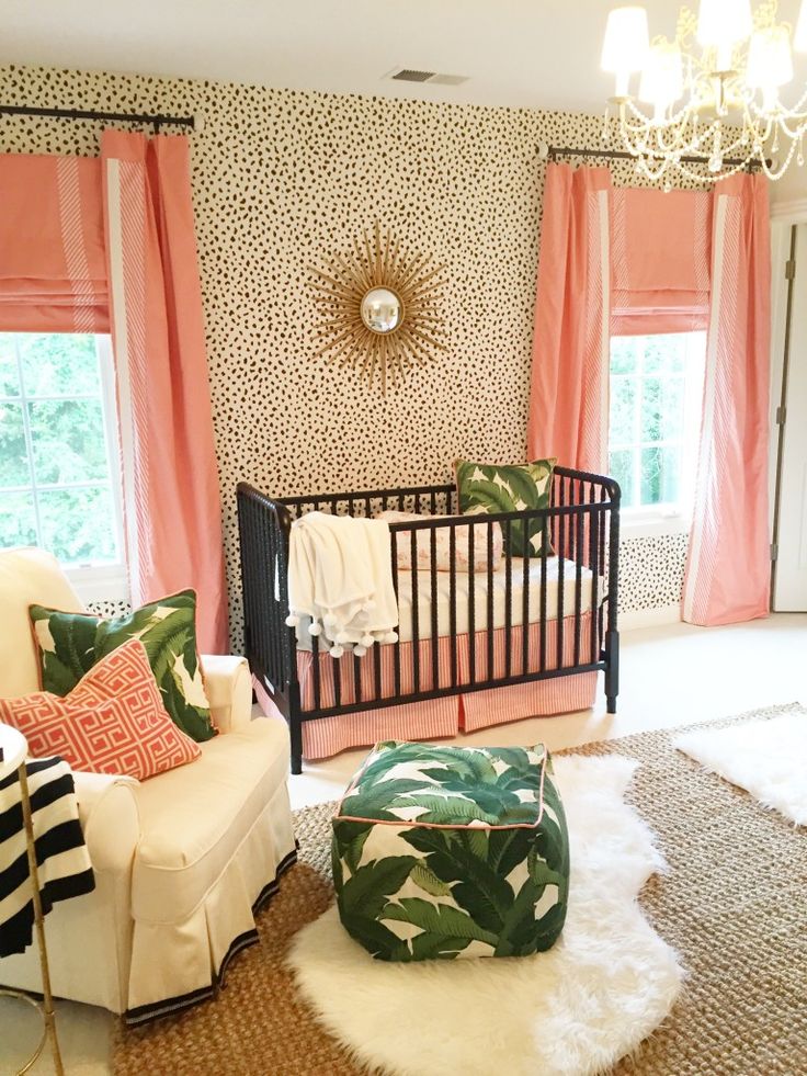 Dalmatian print wallpaper in a tropical nursery