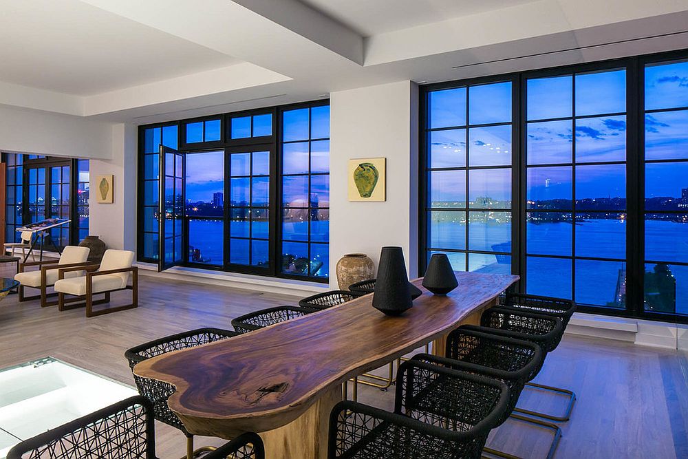 Live edge table brings an eclectic and natural vibe to the dining room of this New York home [Design: Meridith Baer Home]