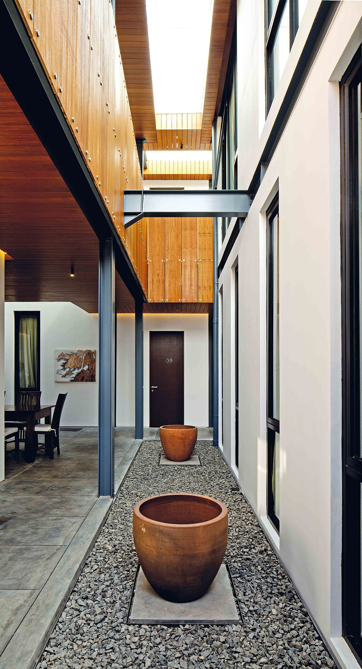 Long corridors and indoor courtyards bring ventilation into all the bedrooms