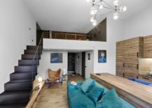 Look-at-the-living-area-and-mezzanine-level-of-the-ultra-small-apartment-in-Kiev-217x155