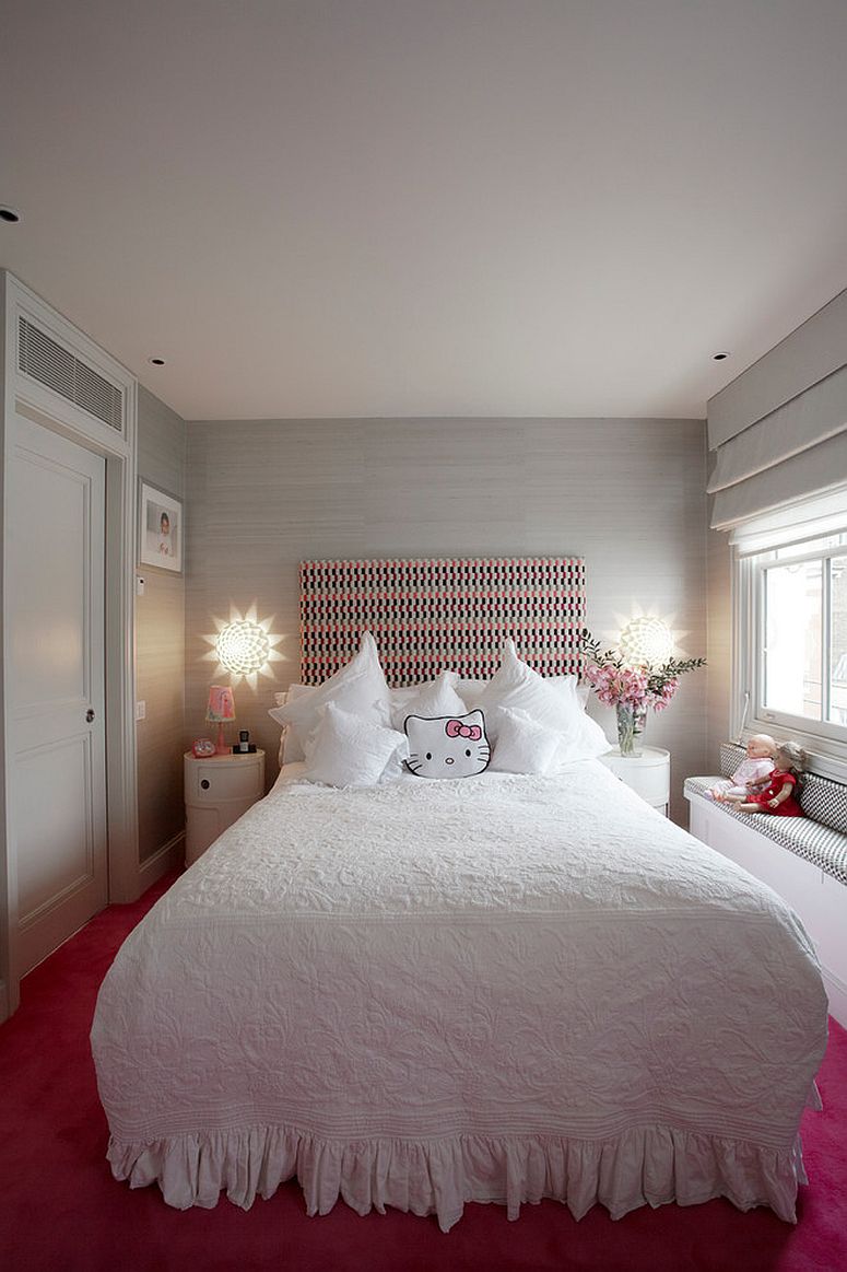 Lovely Hello Kitty pillow perfectly complements the white and pink color scheme of the kids' bedroom [Design: TLA Studio aka Trevor Lahiff Architects]