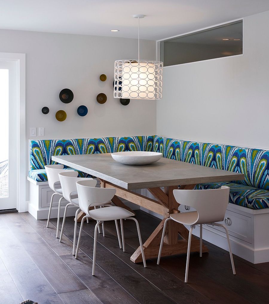 Lovely lighting and colorful seating define a fabulous banquette dining [Design: Eric Aust Architect]