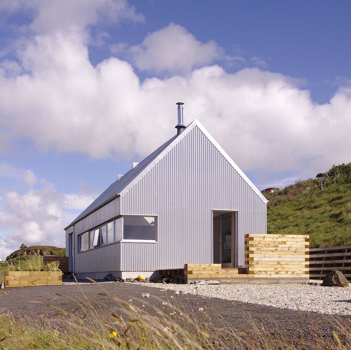 Metal and glass exterior of the Tinhouse combines farmhouse look with modern aesthetics