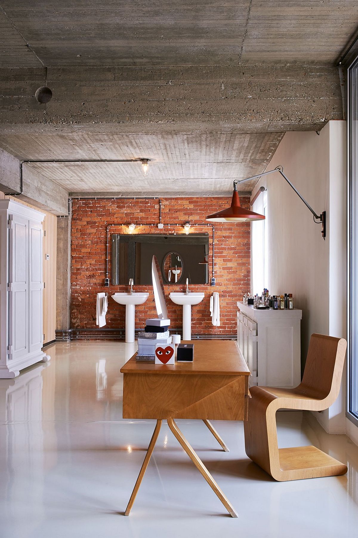 Modern bathroom with exposed brick wall