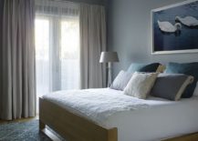 Modern-bedroom-in-white-with-a-dash-of-blue-217x155