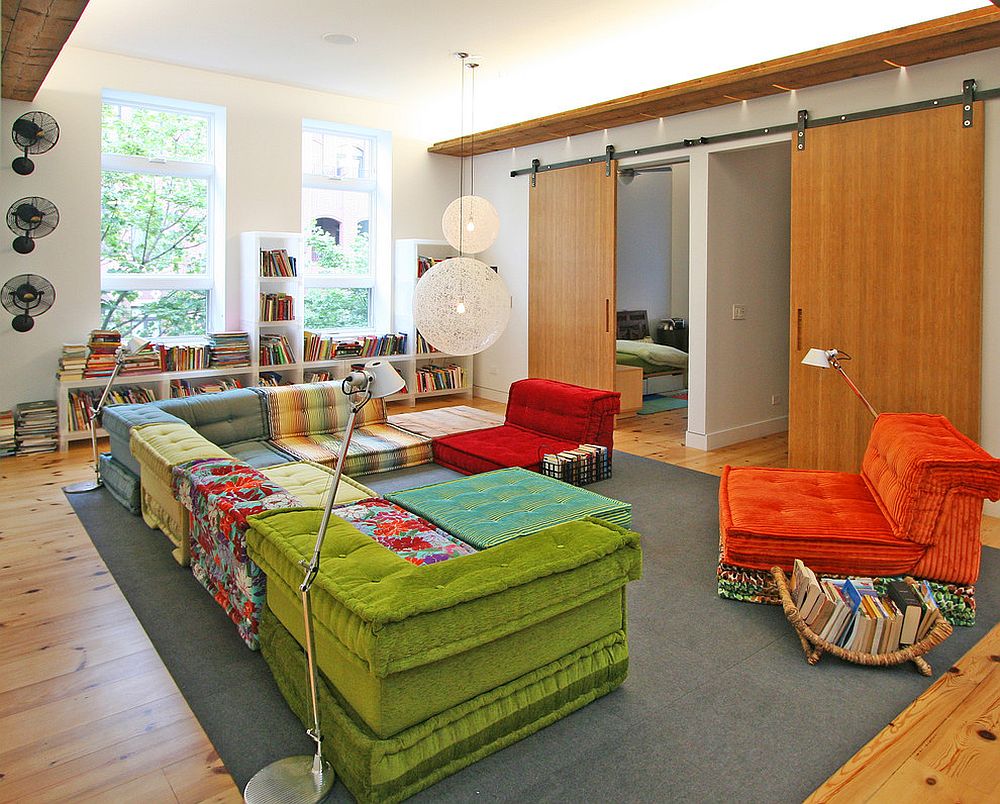 Moooi Random Lights enliven the colorful playroom with sliding barn doors