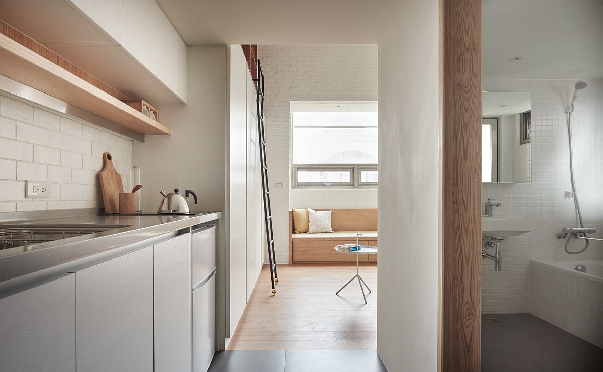 Narrow entrance to the kitchen and bathroom of the small urban apartment