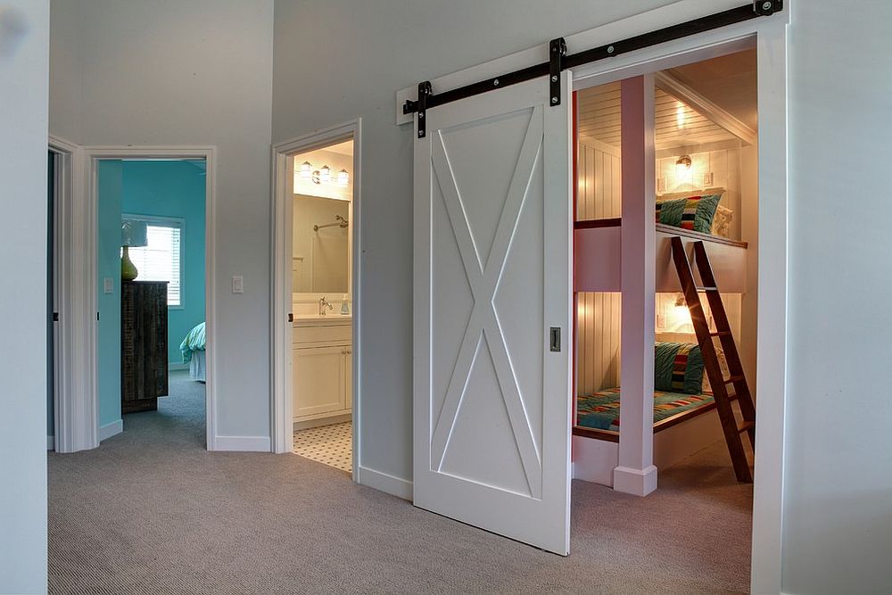 Nifty barn door is a great choice for the breezy beach style kids' bedroom [Design: Cottage Home]