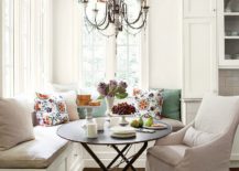 Pillows and drapes add color and freshness to the all white banquette 217x155 Space Saving Design: 25 Banquettes with Built in Storage Underneath