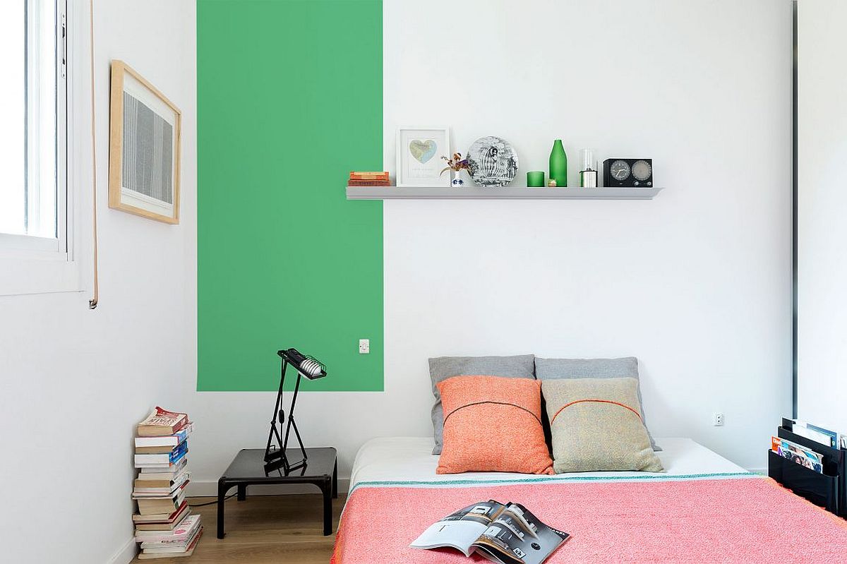 Playful way of adding color to the neutral, contemporary bedroom
