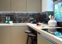Revamped-kitchen-space-on-the-second-level-with-a-glittering-backsplash-217x155