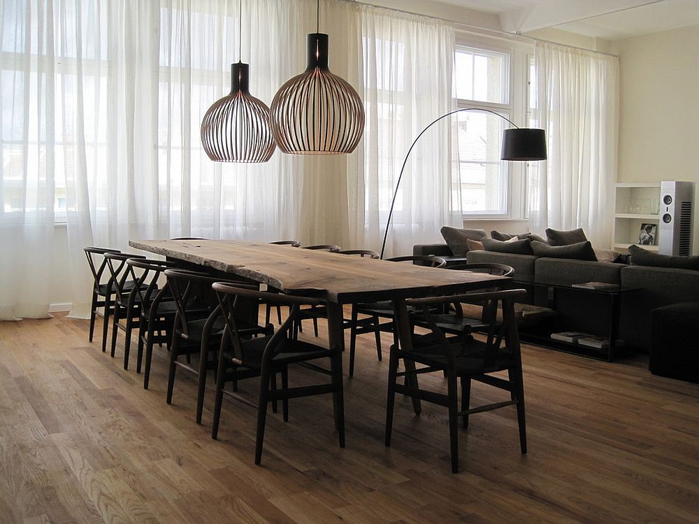 Scandinavian style dining room with a live edge table [Design: Laux Interiors Berlin]