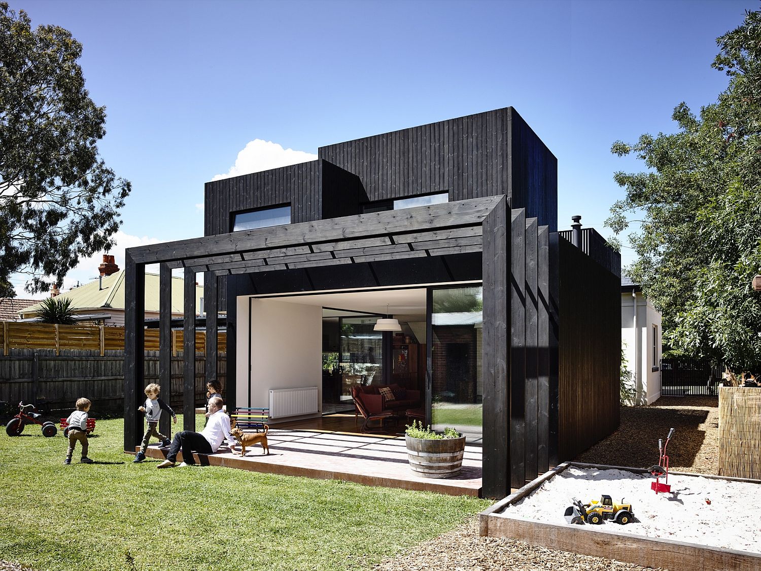 Series of simple structures give the old Victorian home a stylish makeover