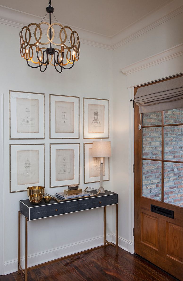 Simple and beautiful entry with a slim desk and gallery wall [From: TY Larkins Interior / Chad Chenier Photography]