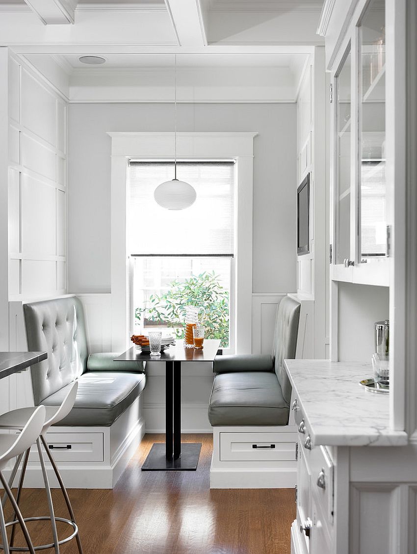 Simple booth style banquette makes smart use of space in the kitchen