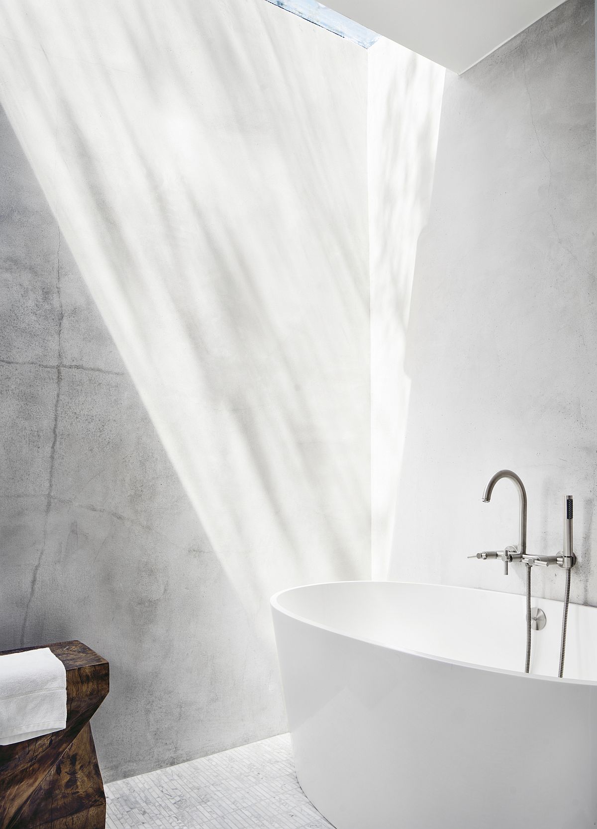 Skylight for the contemporary bathroom in white with standalone bathtub