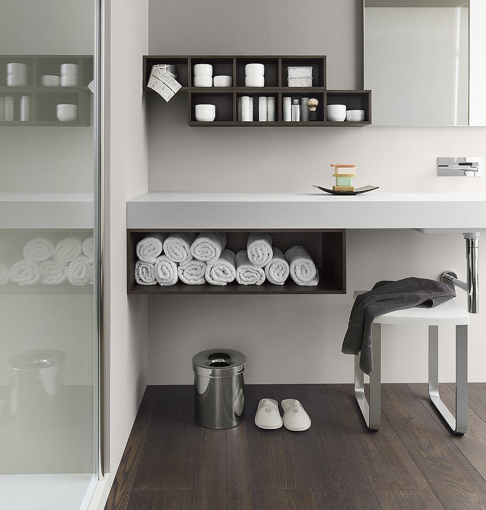 Sleek floating vanity with open storage space for towels