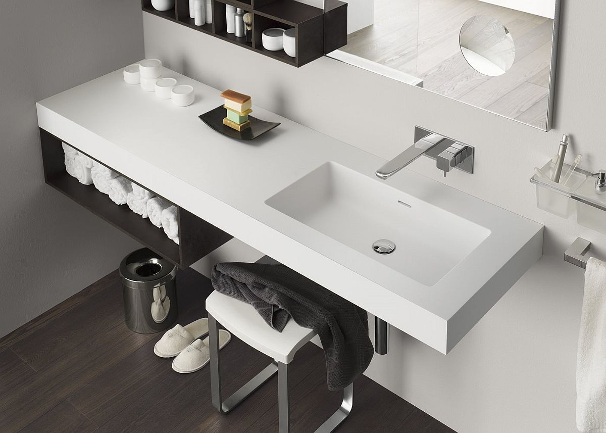 Sleek laminate finishes allow the vanity and cabinets to complement one another elegantly