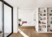 Small-balcony-and-large-glass-doors-bring-in-plenty-of-light-into-the-apartment-217x155