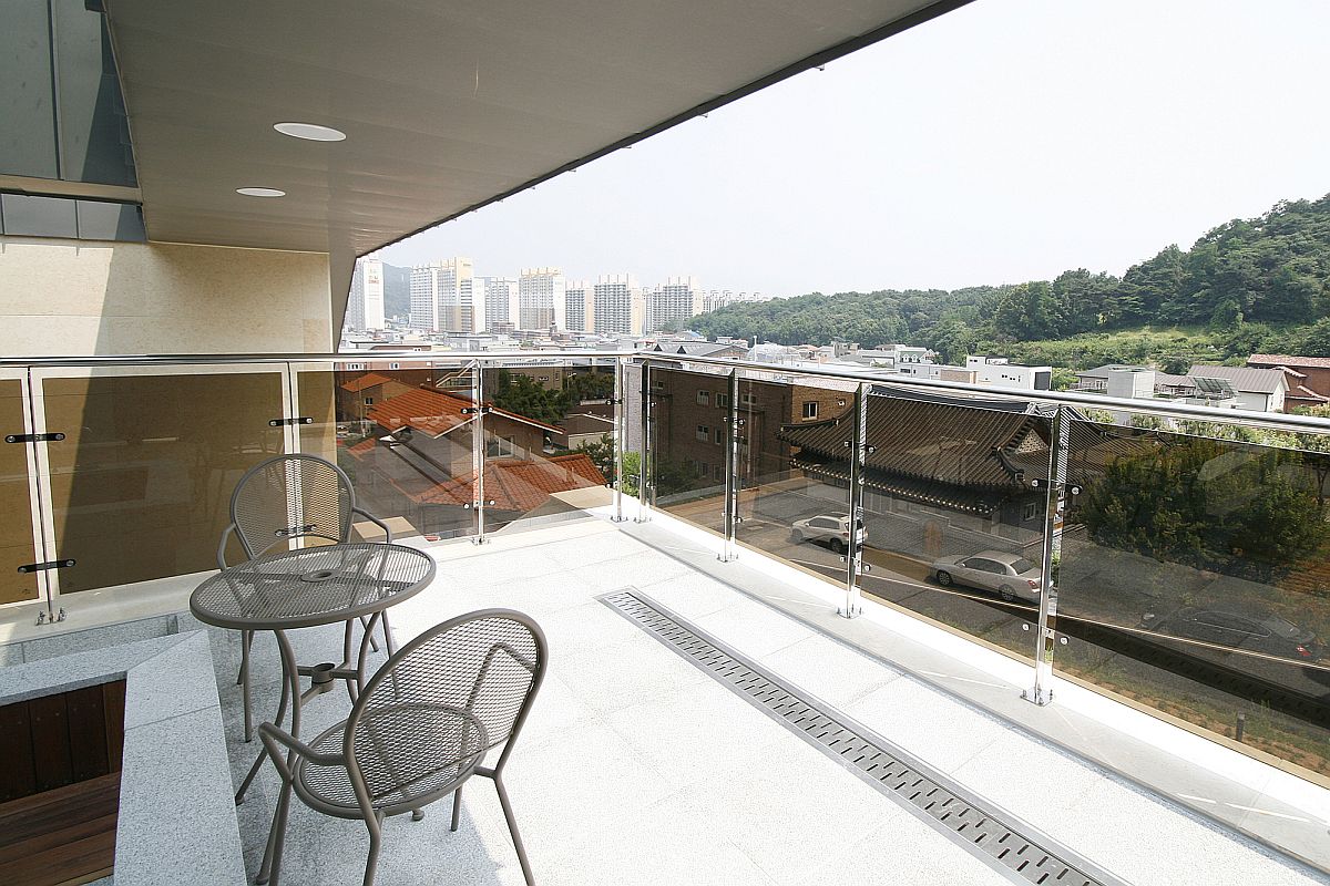 Small balcony offers scenic views of the surrounding village