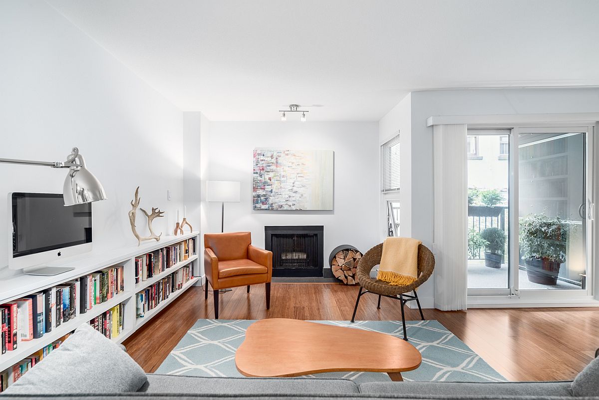 Small living room with wood burning fireplace of the Nicola Street apartment