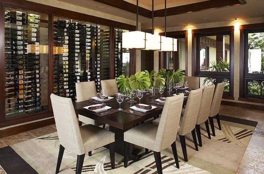 Smart Asian dining room with wine storage and tropical flair