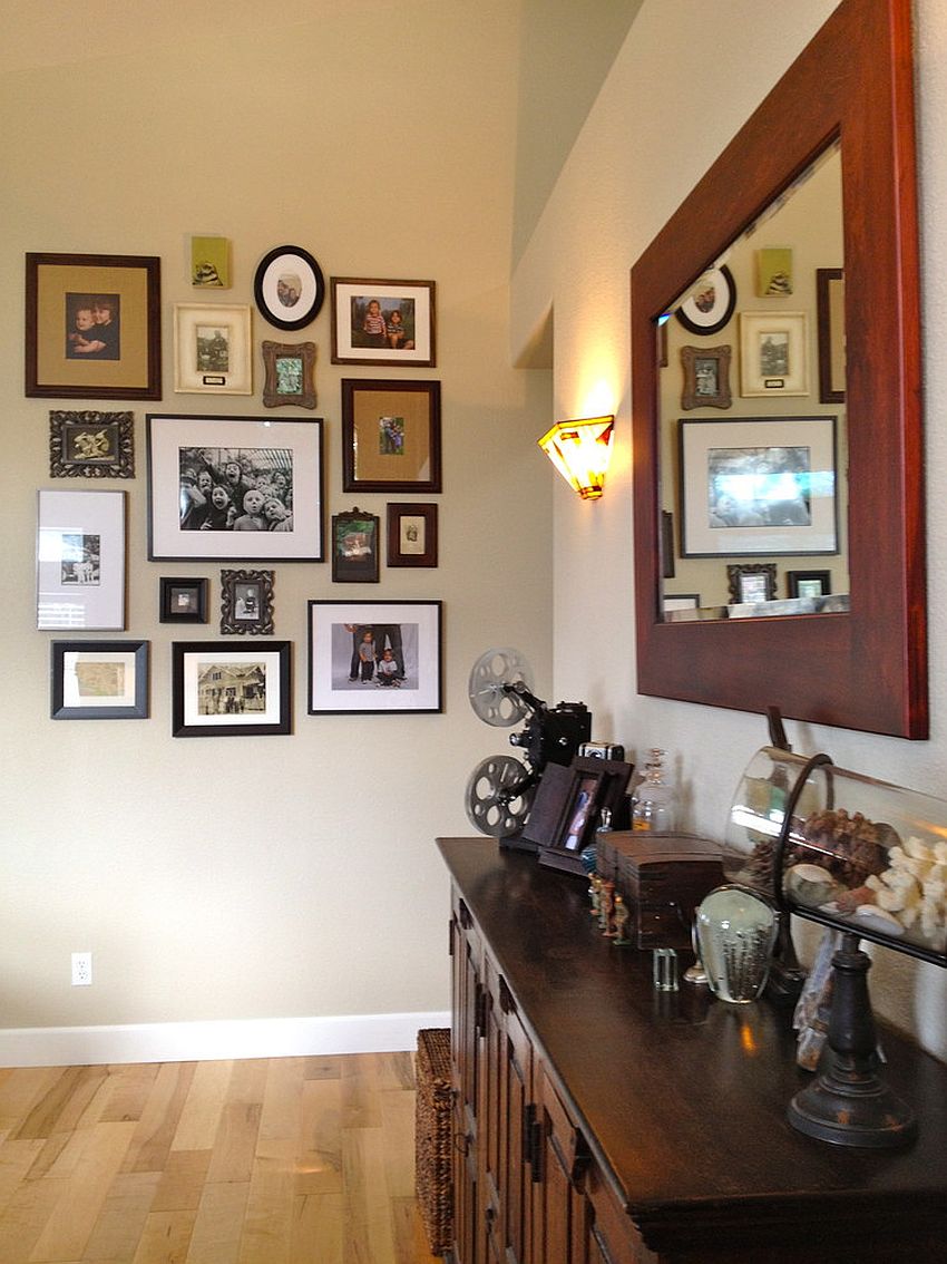 Smart photo collage wall for the eclectic entry [Design: The Vintage Bean]