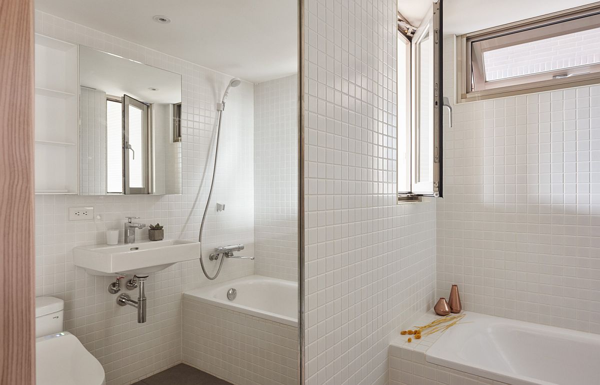 Spacious and light filled bathroom and shower area of the small Taipei apartment