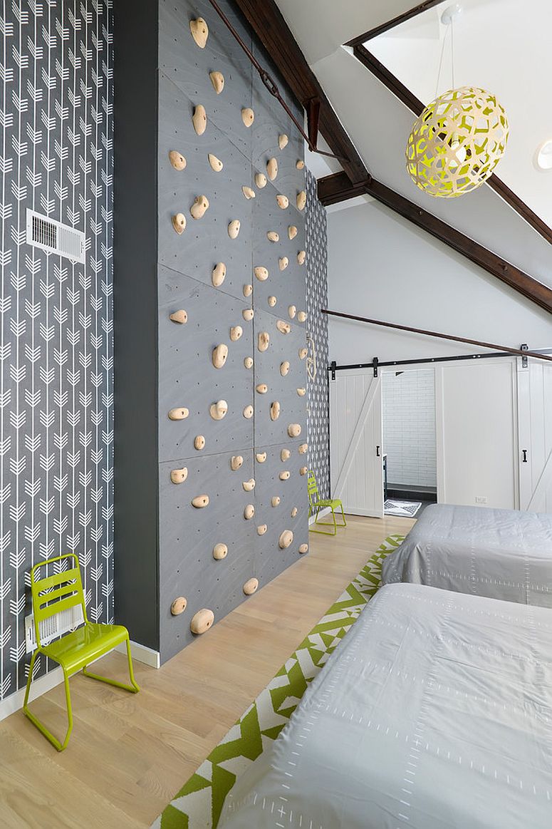 Spacious kids room with climbing wall and sliding doors