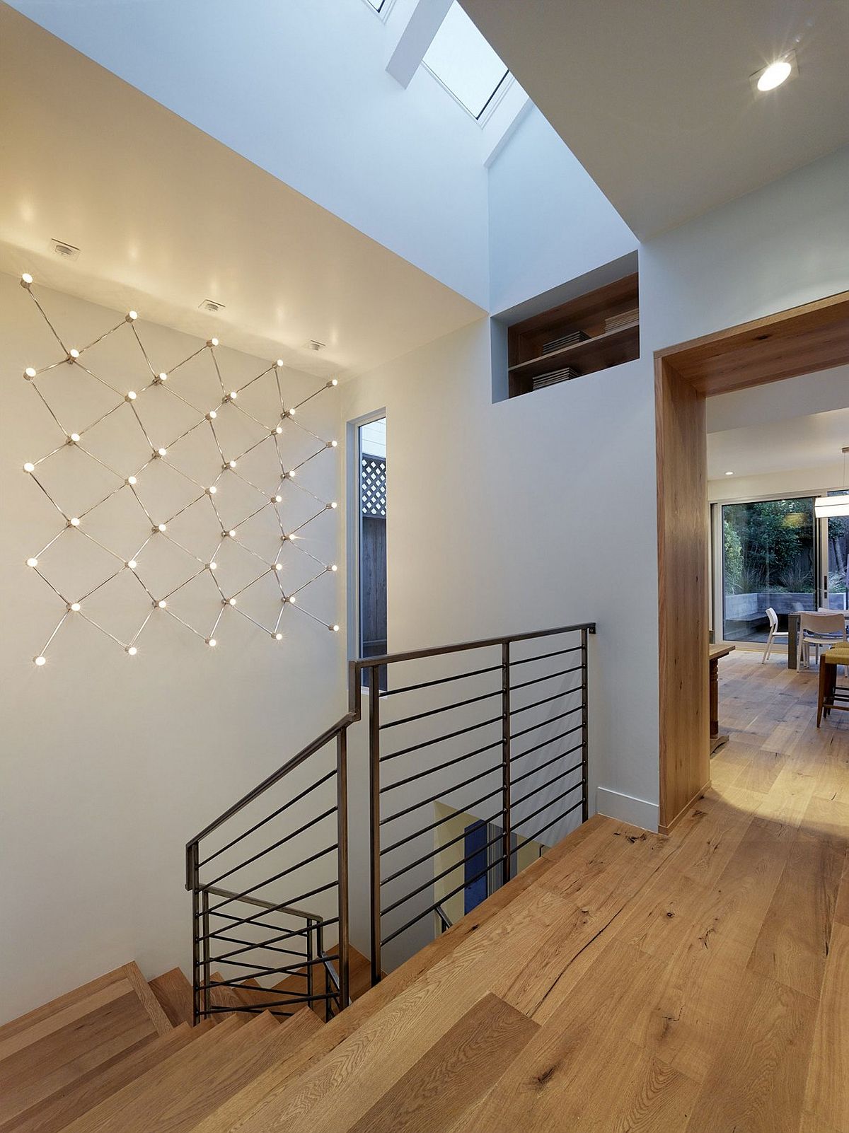 Staircase connects the various levels of the stylish San Francisco home