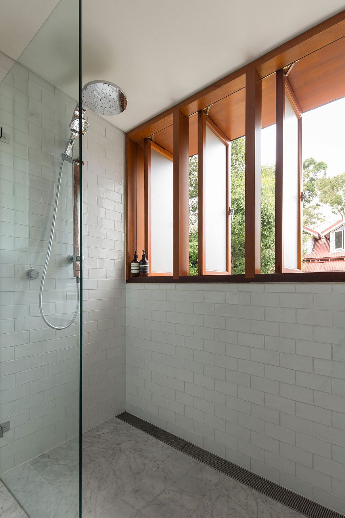 Swiveling windows provide the modern bathroom with necessary ventilation