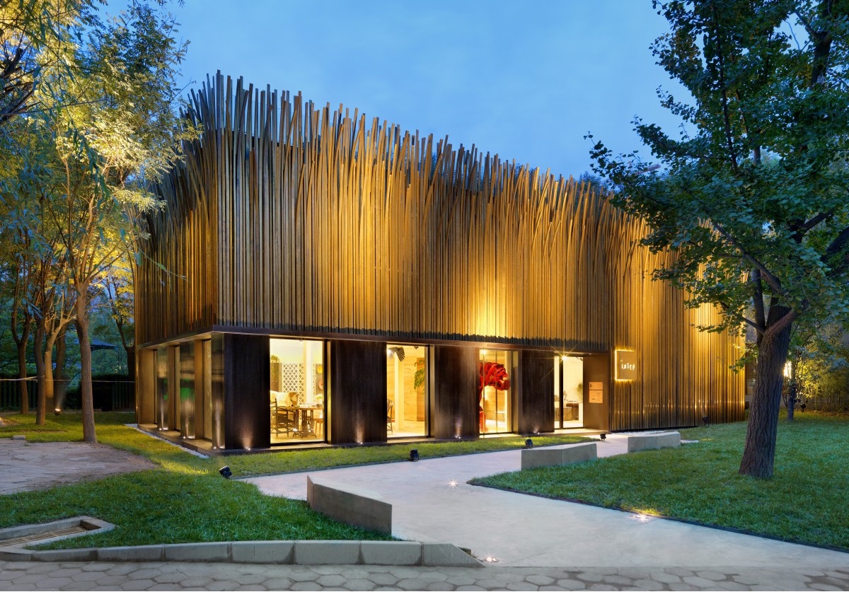 Tales Pavilion for design distributor Tales. This free-standing design showroom in Beijing is Nichetto Studio's first architectural design. The building's facade is covered in 1,200 individual grass-like strands of brass.