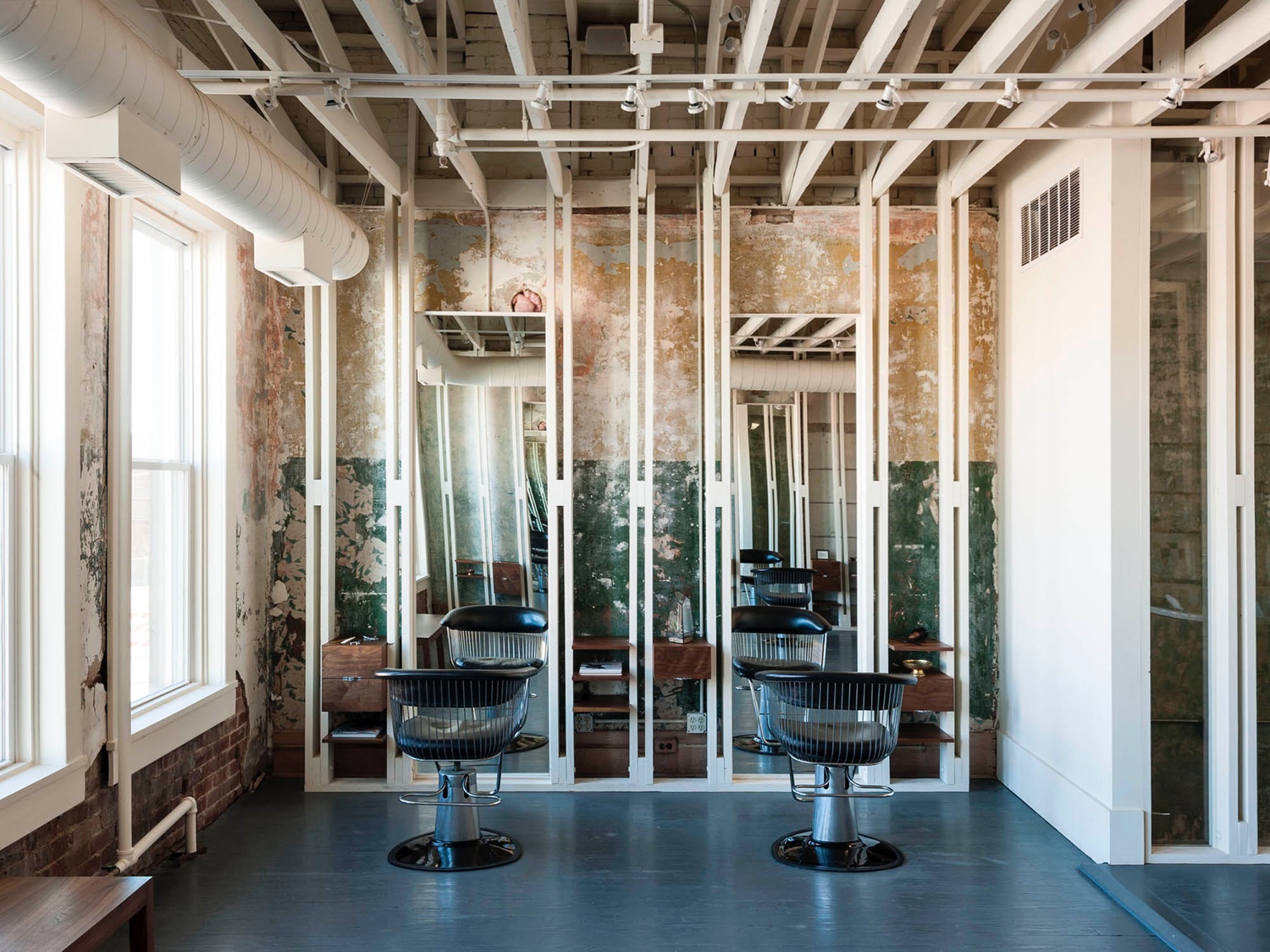 The First Ward is a salon located in Tulsa, Oklahoma. Housed in a former brothel, the space partly maintains a beautifully decaying interior, the result of its time as a "house of ill repute".