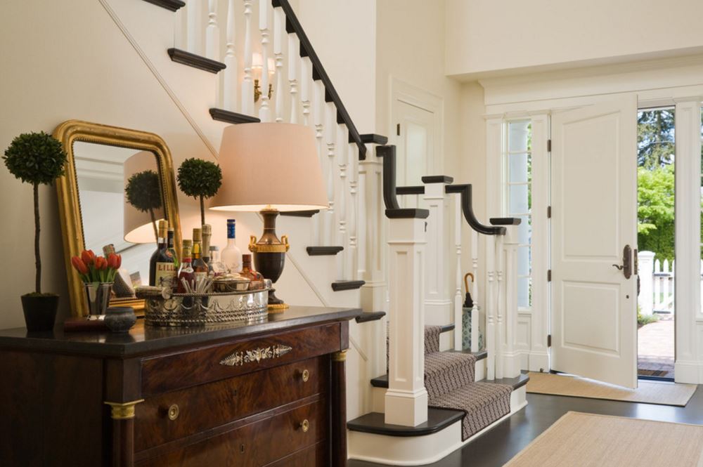 Topiaries adorn an entry dresser