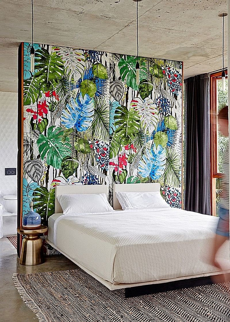 Tropical bedroom with a colorful accent wall [Design: eDezeen]