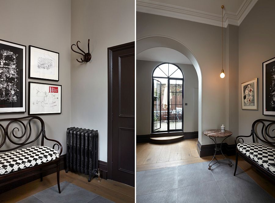 Victorian entry with a simple gallery wall in black and white