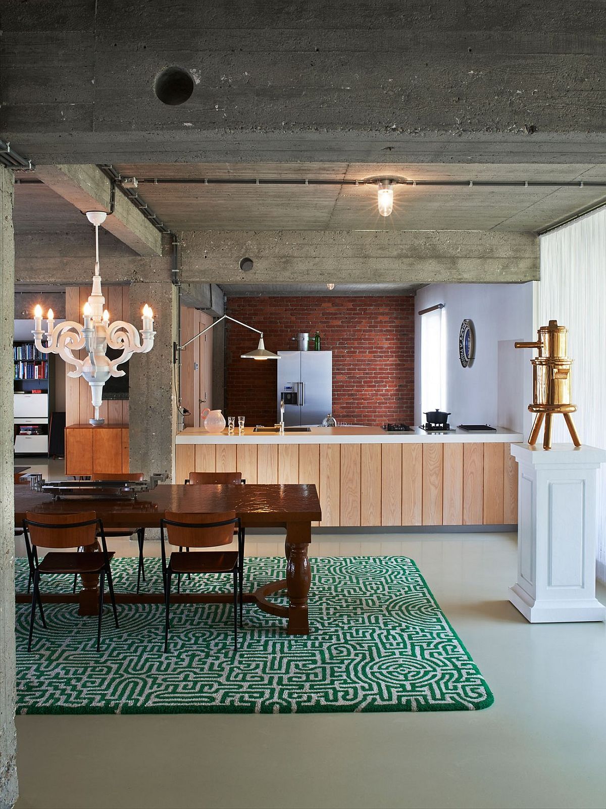 Vintage elements and industrial flair meet inside fun Antwerp loft