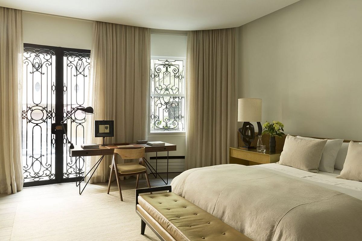 Vintage modern bedroom with small home office in the corner