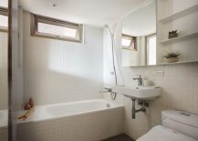 White-tiles-and-natural-light-give-the-bathroom-a-spacious-and-airy-appeal-217x155