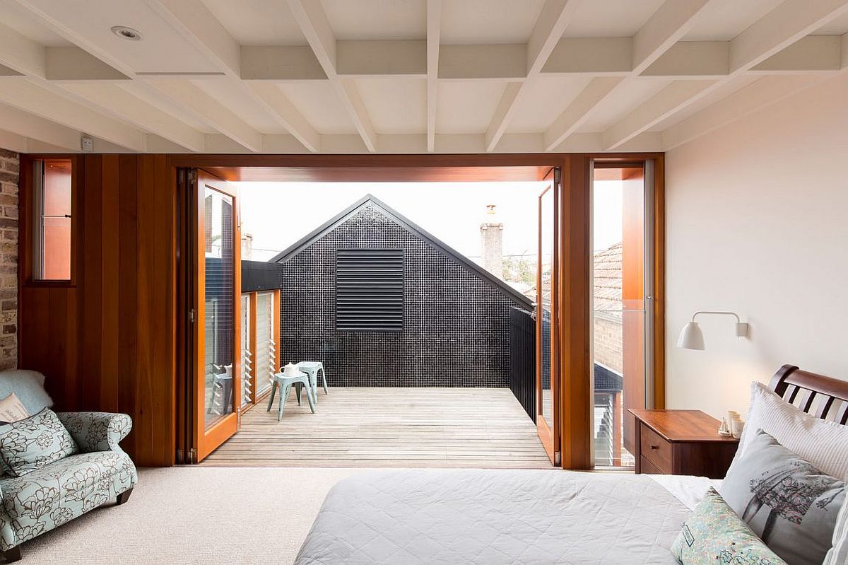 Wooden deck on the top level connected to the master bedroom