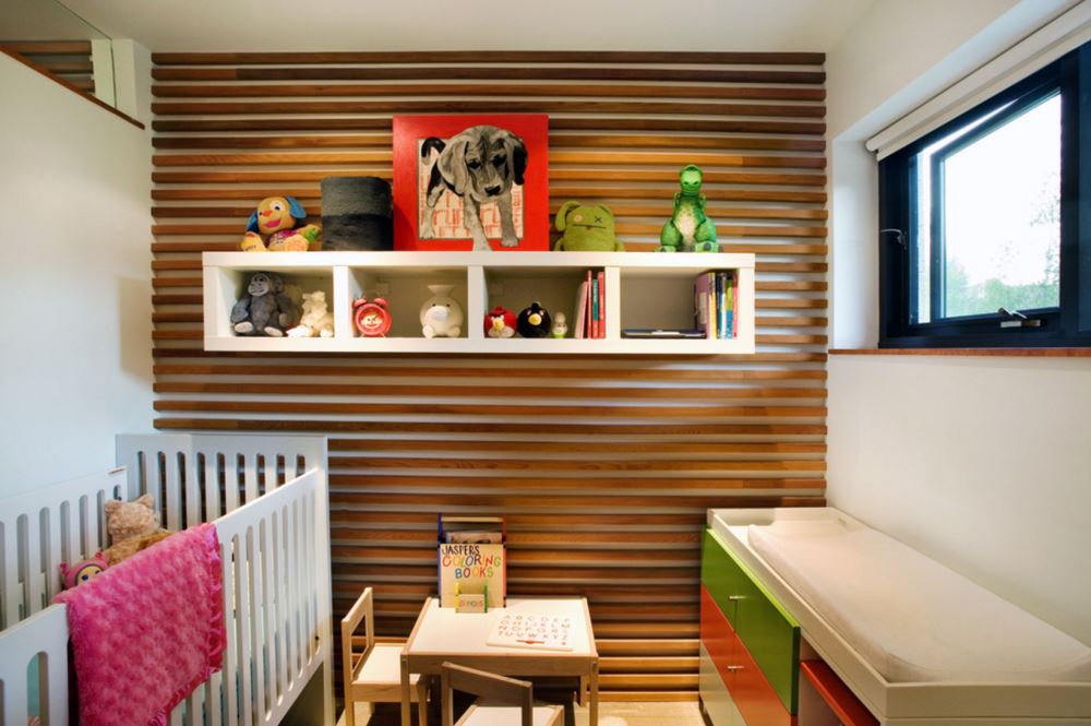 Wooden paneling in a modern nursery