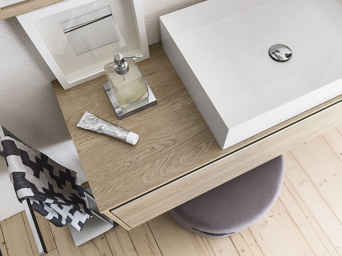 Wooden vanity series provides textural contrast to the modern bathroom