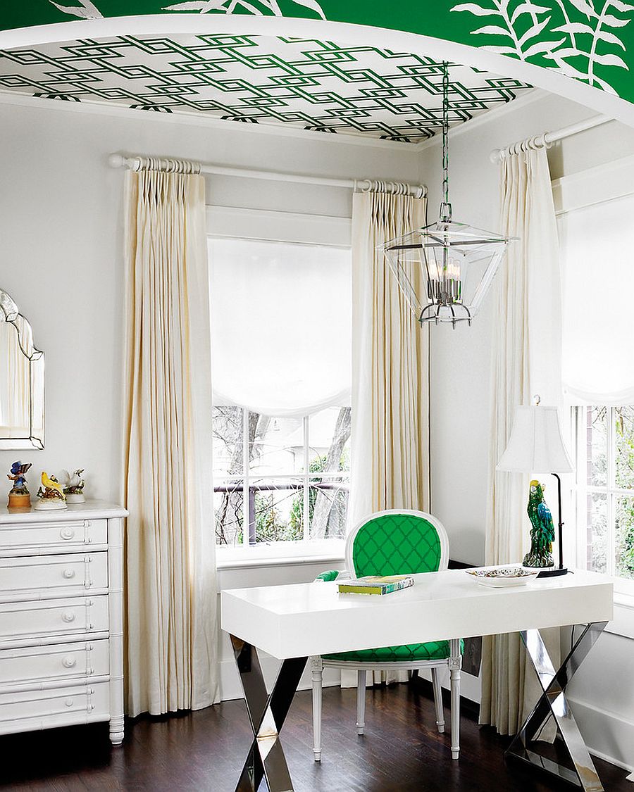 A splash of green enlivens the cool home office in white