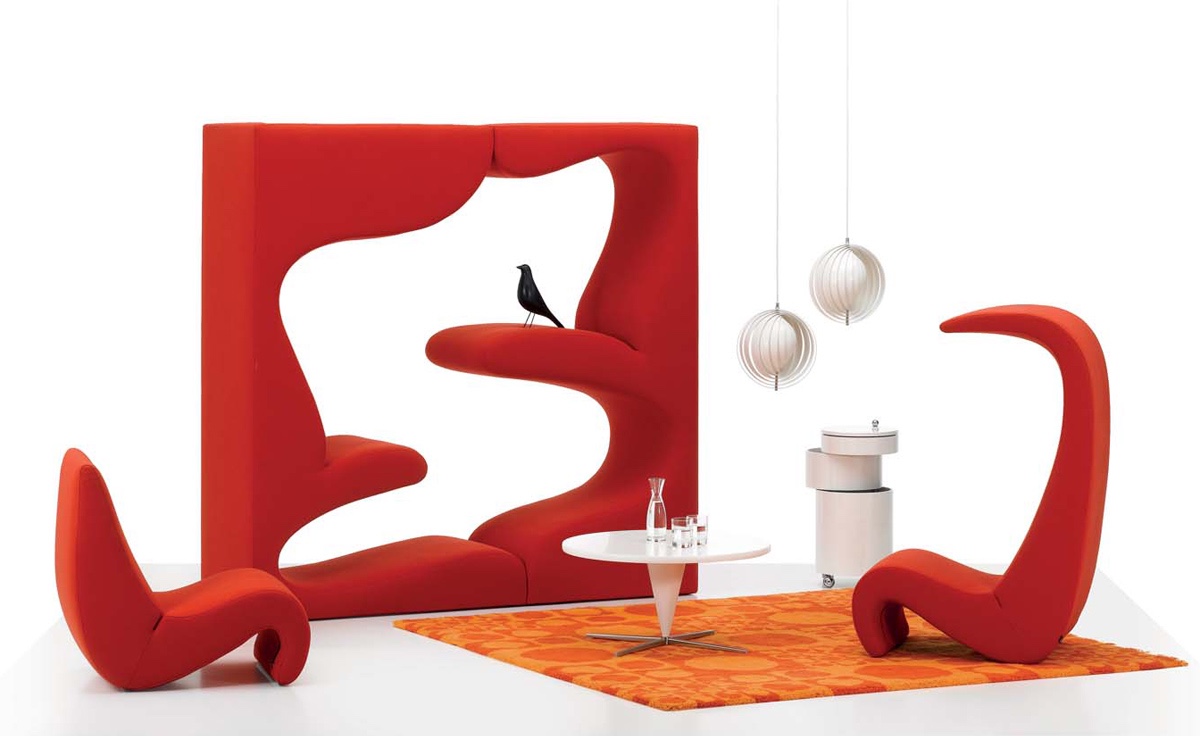 Amoebe chair and high-back version (pictured with Verner Panton's 1969 Living Tower). Image via Hive.