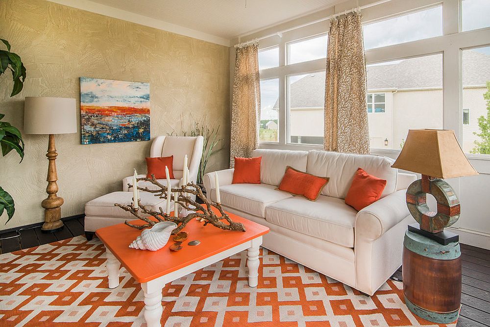 Beachy tropical style sunroom in orange [Design: Nth Degree Home]