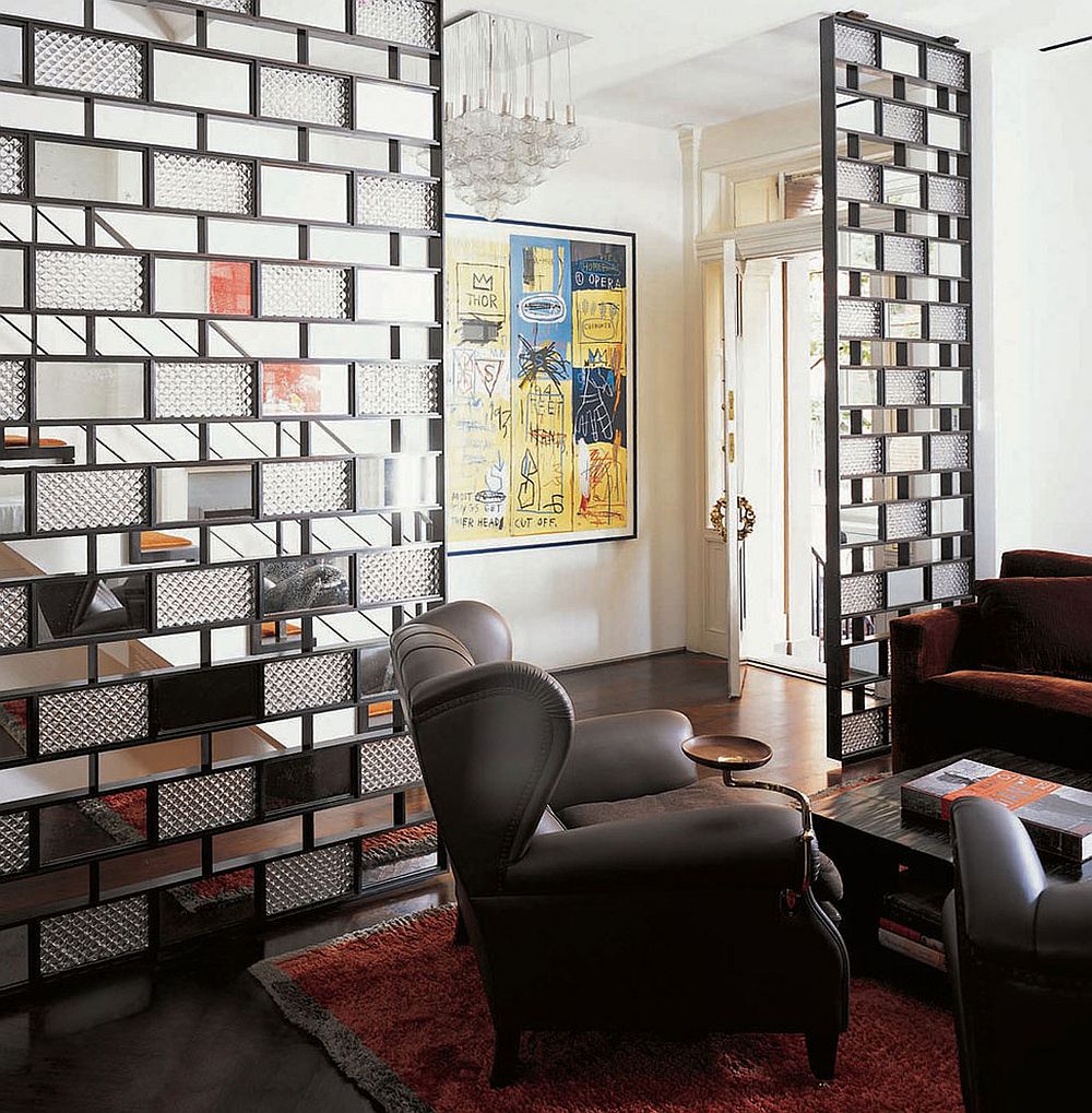 Bronze plates, glass and mirrors shape a stunning room divider