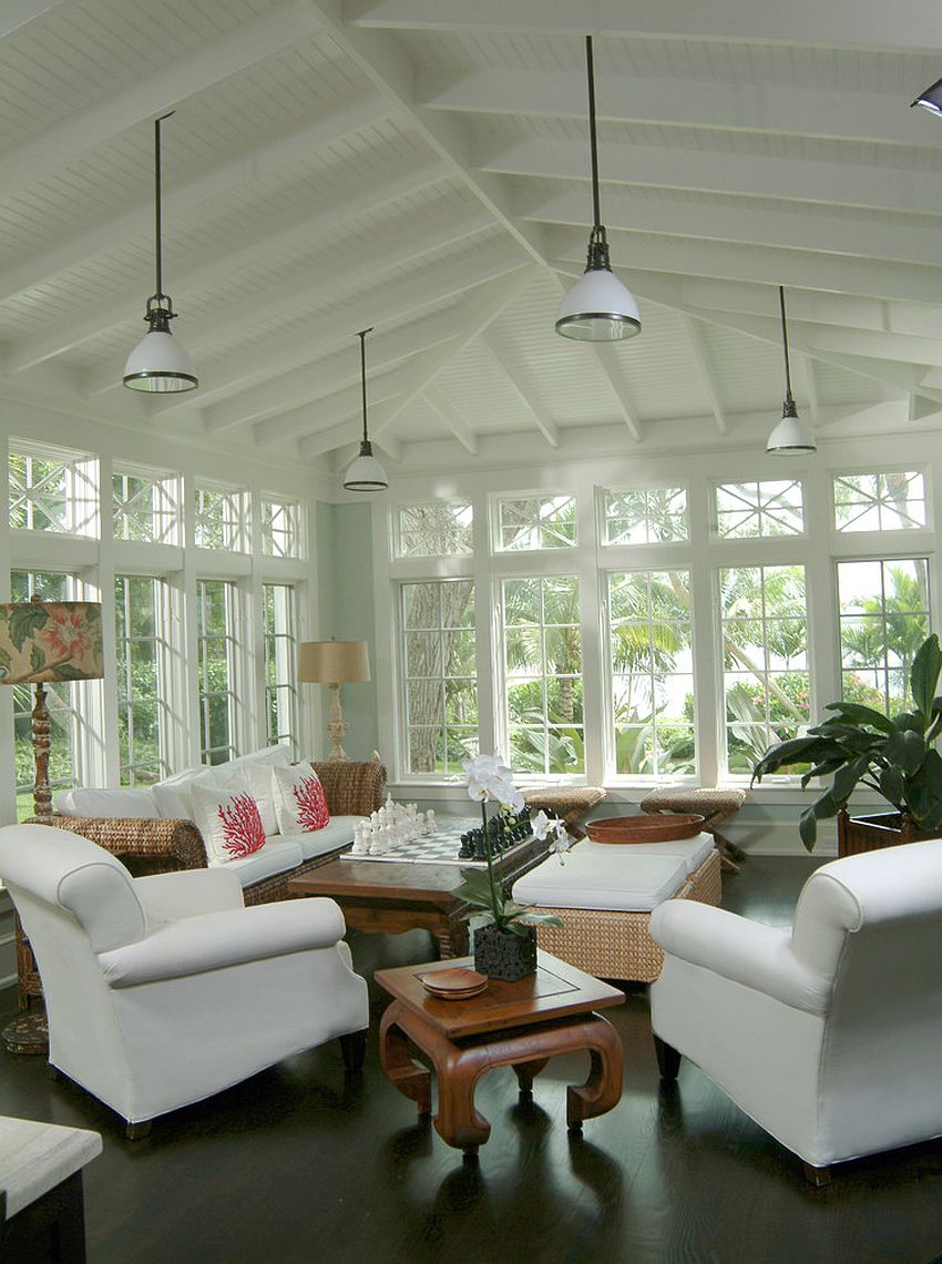 Coastal and tropical styles combined elegantly in the sunroom [From: Rob Downey Photography]