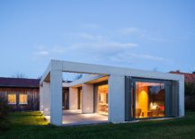 Contemporary-concrete-extension-stands-in-contrast-to-the-original-timber-home-217x155