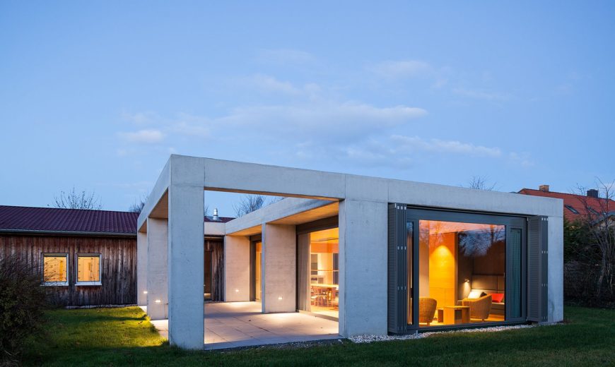 Glass and Concrete Pavilion Extends Timber-Paneled Home in Leipzig