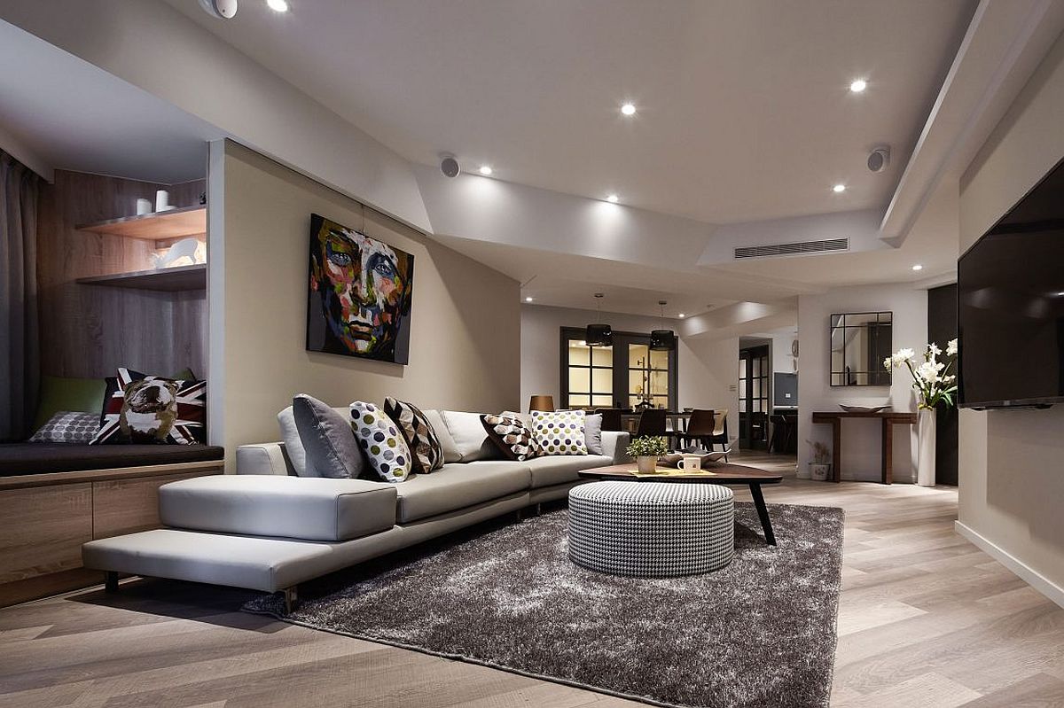 Cozy reading nook in the living room with bench that offers built-in storage